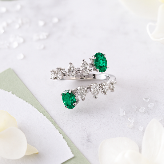 Elegant Spiral Diamond & Emerald Ring