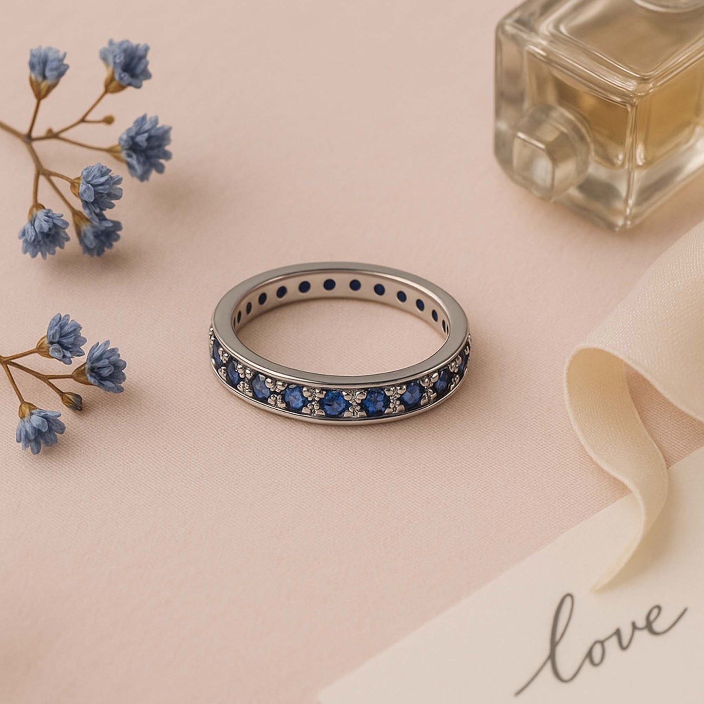 Minimalist Eternity Ring with Alternating Sapphire