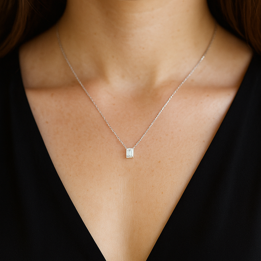 Timeless Solitaire Pendant with 0.71 Ct Emerald Cut Diamond