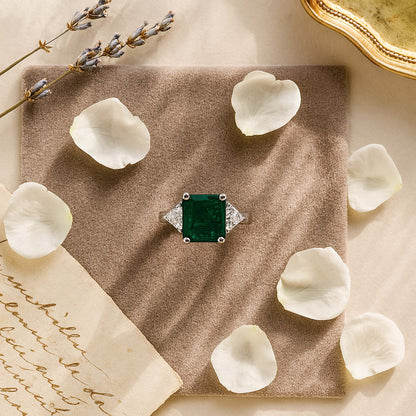 Classic Emerald Cut Emerald Ring with Trillion Diamond Sides